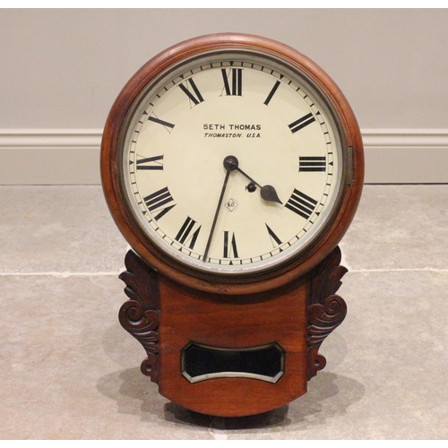 699 - An American walnut cased drop dial wall clock by Seth Thomas, the 30cm painted dial applied with Rom... 