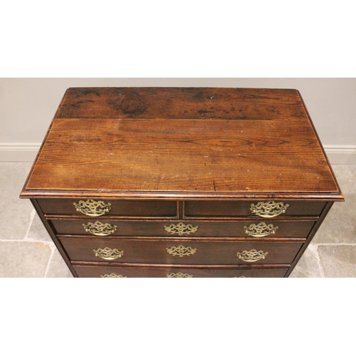 711 - A mid 18th century oak chest of drawers, formed as four long graduated drawers (later re-constructed... 