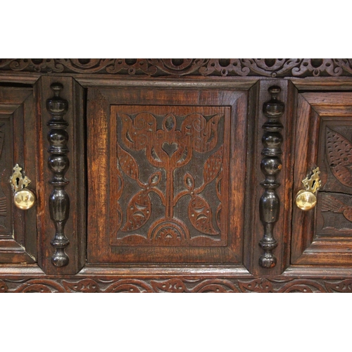 721 - An early 18th century and later constructed Welsh oak court cupboard, Cwpwrdd Deuddarn, dated 1706, ... 