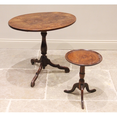 728 - A George III fruitwood tripod table, the oval top with moulded detail to the edge, raised upon a bal... 