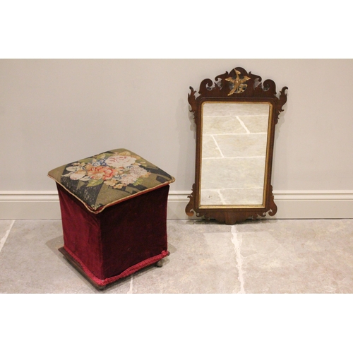 730 - A George III mahogany fretwork wall mirror, the gilt phoenix crest above the rectangular mirrored pl... 