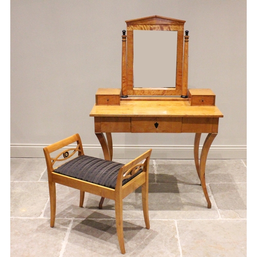 744 - A Biedermeier style satin birch dressing table, mid 19th century, the rectangular mirrored plate wit... 