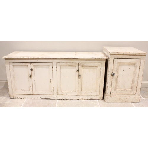 746 - A 19th century painted pine housekeepers cupboard base, formed from two pairs of panelled cupboard d... 