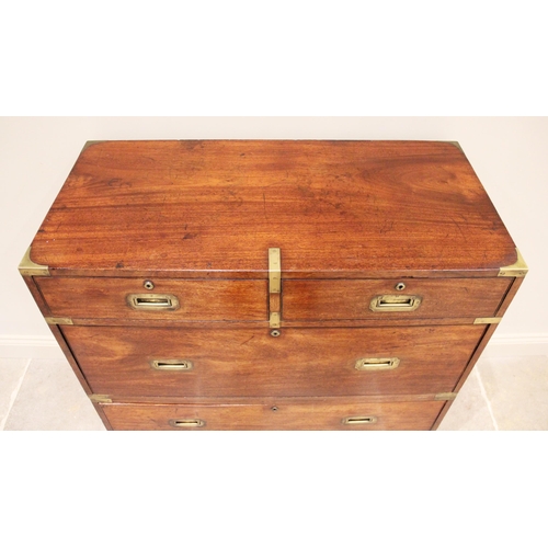 754 - A 19th century mahogany two section campaign chest of drawers, formed from two short over one long d... 