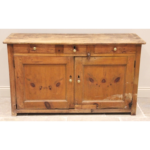 758 - A Victorian pine kitchen dresser base, the rectangular board top over two frieze drawers and two cup... 