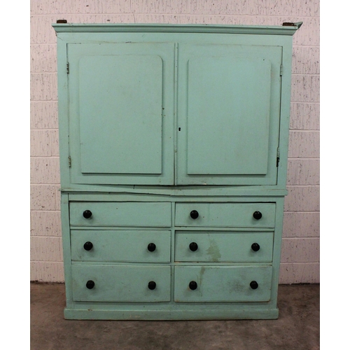 760 - A 19th century painted pine housekeepers cupboard, the moulded cornice above a pair of relief moulde... 