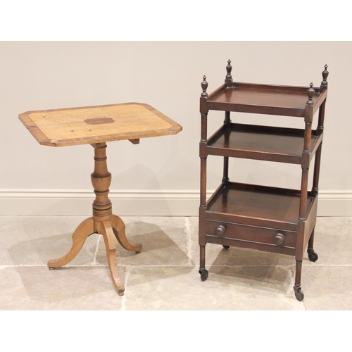 762 - A Victorian mahogany etagere/whatnot, the urn finials above a galleried top tier, raised upon ring t... 