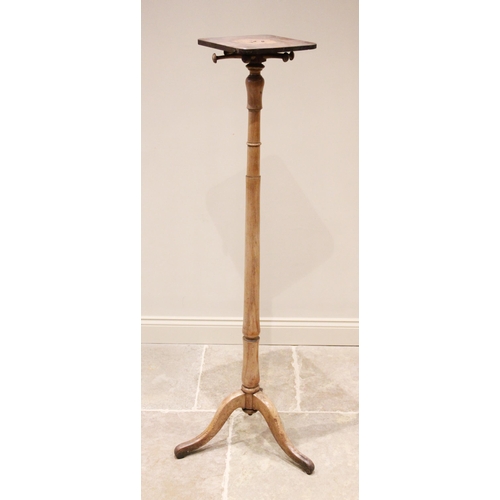 768 - A Victorian mahogany torchere / coat stand, the turned cylindrical column extending to three down sw... 