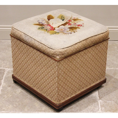 774 - A Victorian mahogany framed ottoman, of cubic form, the hinged upholstered needlework top opening to... 