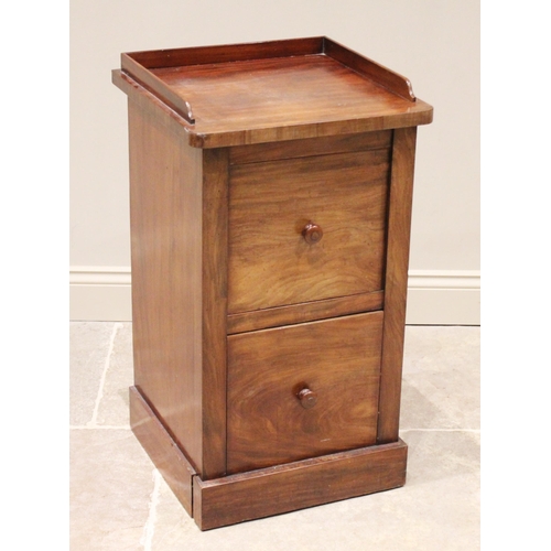 776 - A Victorian mahogany bedside cupboard, the three quarter galleried top above a cupboard door and sli... 