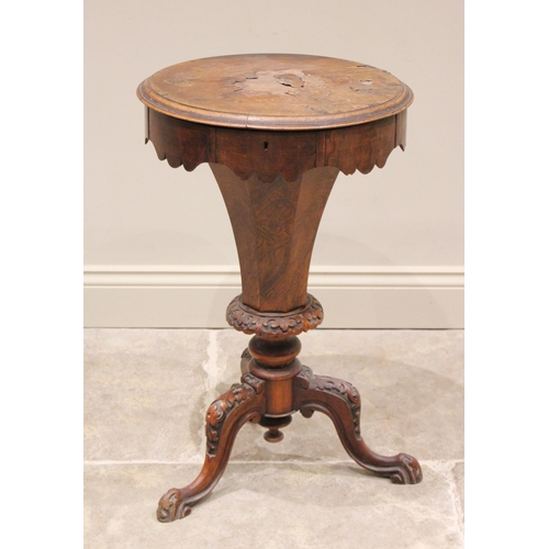 777 - A Victorian burr walnut sewing table, of trumpet form, the circular top opening to a compartmentalis... 