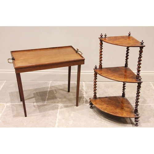 779 - A Victorian figured walnut etagere/whatnot, of free-standing corner form with three graduated shelve... 