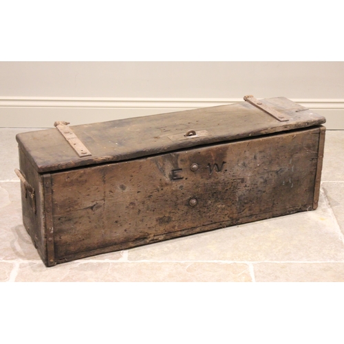 782 - A 19th century pine chest, applied with substantial iron hinges and side handles, carved initials 'E... 