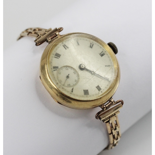 79 - An Edwardian 18ct gold fob watch, the round dial with Roman numerals and subsidiary dial to six 'o' ... 