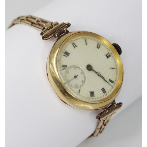 79 - An Edwardian 18ct gold fob watch, the round dial with Roman numerals and subsidiary dial to six 'o' ... 