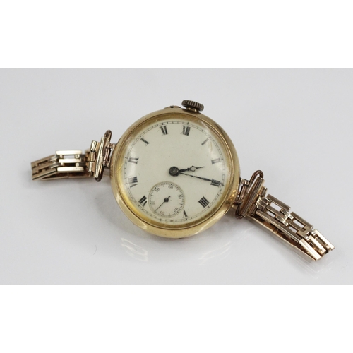 79 - An Edwardian 18ct gold fob watch, the round dial with Roman numerals and subsidiary dial to six 'o' ... 