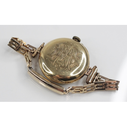 79 - An Edwardian 18ct gold fob watch, the round dial with Roman numerals and subsidiary dial to six 'o' ... 