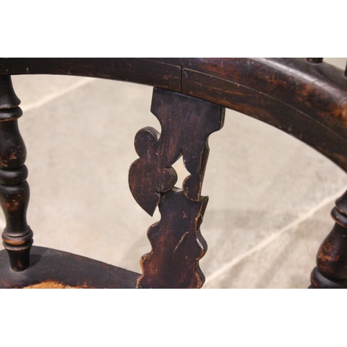 791 - A 19th century elm, ash and alder Windsor farmhouse elbow chair, the hoop back with central pierced ... 