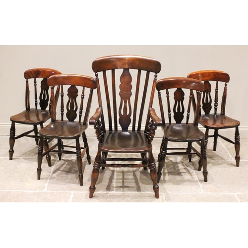 794 - A Victorian style stained beech wood Windsor farmhouse elbow chair, the central pierced splat back a... 