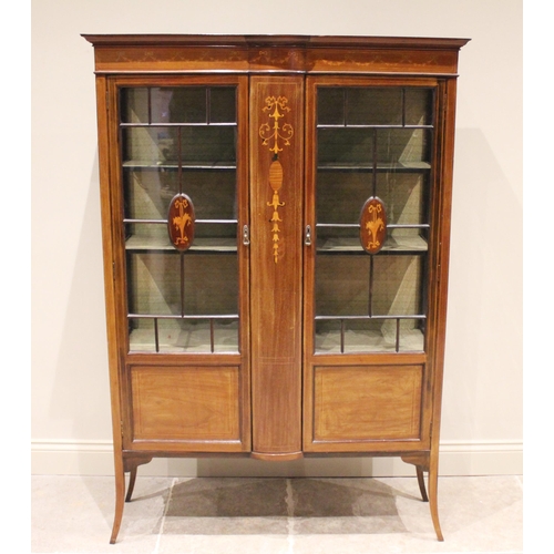 812 - An Edwardian inlaid mahogany display cabinet, inlaid with swags, urns and garlands in satinwood, the... 