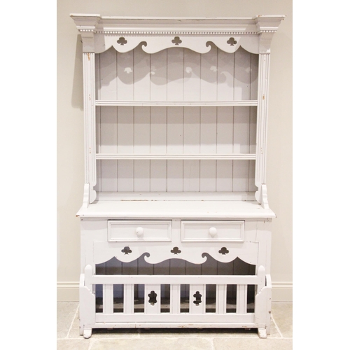 825 - A Victorian style painted pine dresser, 20th century, the moulded dentil cornice above a shaped and ... 