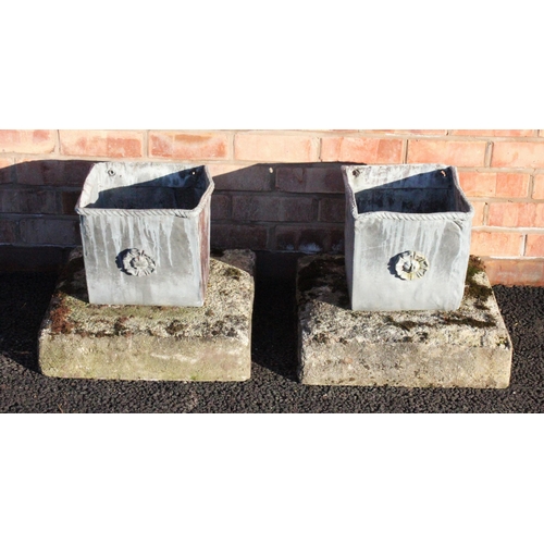 830 - A pair of 19th century lead planters, of cubic form with rope twist detail applied to the rim and a ... 