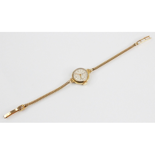 90 - A Ladies Cyma 9ct gold vintage wristwatch, the circular dial with engine turned decoration, Arabic n... 