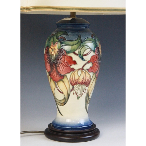 A Moorcroft lamp decorated in the 