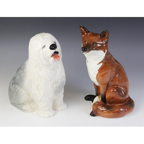 550 - A Beswick Fireside Old English Sheep Dog, model No. 2232 (discontinued 1989), 29cm high, together wi... 