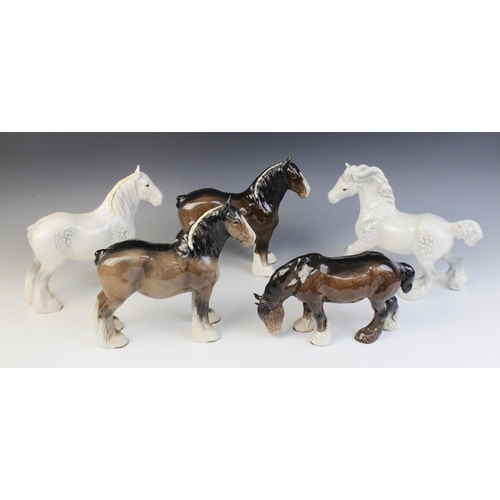 553 - Six Beswick shire horse models, comprising: a Grey Cantering Shire, model No. 975 (discontinued 1989... 