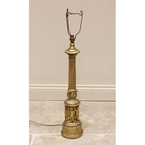 600 - A gilt composite column table lamp, 20th century, the reeded and tapering column extending to a foli... 