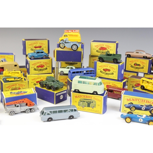 655 - A collection of twenty six boxed Moko Lesney Matchbox die-cast model vehicles, comprising: numbers 1... 