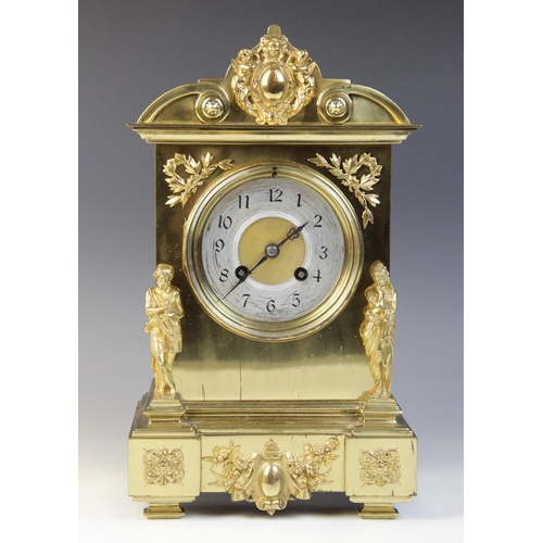 682 - A late 19th century French brass cased mantel clock by Japy Freres, the architectural case applied w... 