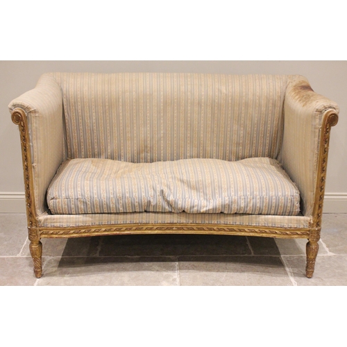 723 - A Louis XVI style giltwood and gesso framed canape/sofa, early 19th century, in the manner of Jean-B... 