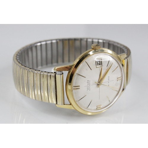 80 - A Gentleman's 18ct gold vintage Nivada automatic wristwatch, the circular dial with baton markers an... 