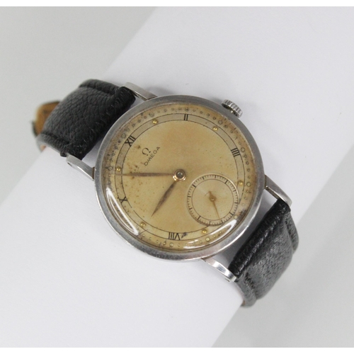 83 - A Gentleman's 1950's Omega automatic wristwatch, circular dial Roman numerals and dot markers, outer... 