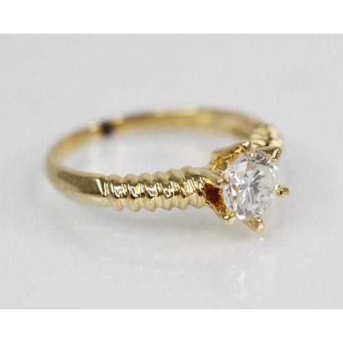 98 - A diamond solitaire ring, the central round brilliant cut diamond weighing approximately 0.70 carats... 