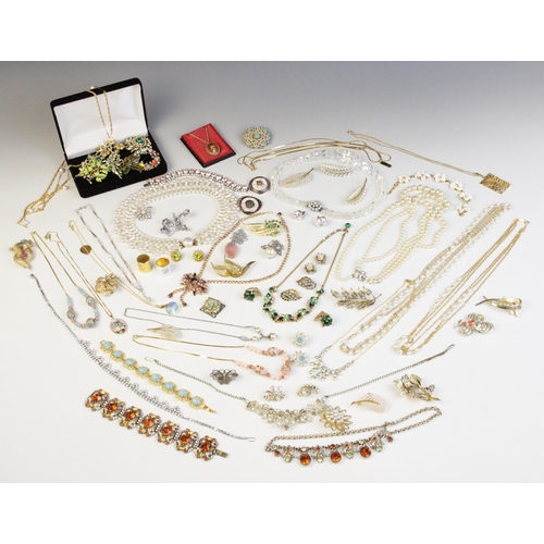 127 - A large quantity of vintage costume jewellery and accessories, including paste set suites, gold colo... 