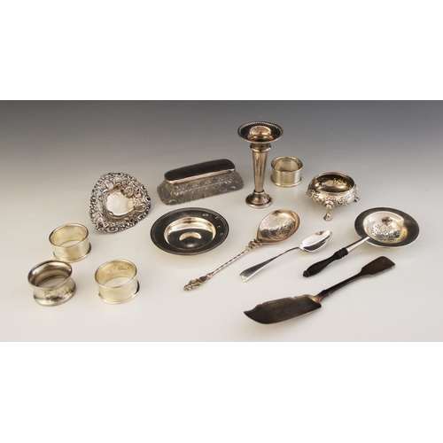 32 - A selection of silver and silver coloured tableware and accessories, to include; a silver circular a... 