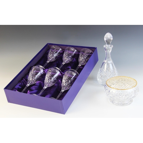 589 - A boxed set of six Edinburgh Crystal wine glasses, each 21cm high, with a matching boxed Edinburgh C... 