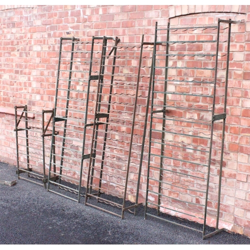 620 - Four wrought iron cellar wine racks early 20th century, the largest 201cm H x 74cm W, 96 bottle capa... 