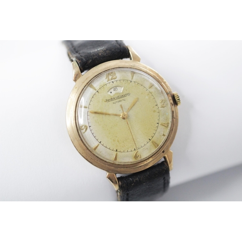 73 - A Jaeger LeCoultre 9ct gold ‘Powermatic’ automatic wristwatch, the pearlescent circular dial with Ar... 