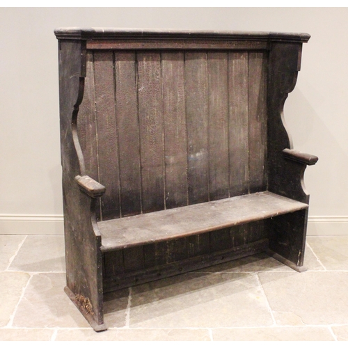 781 - A 19th century scumbled lambing bench/settle, probably pine or elm, the high panelled back extending... 