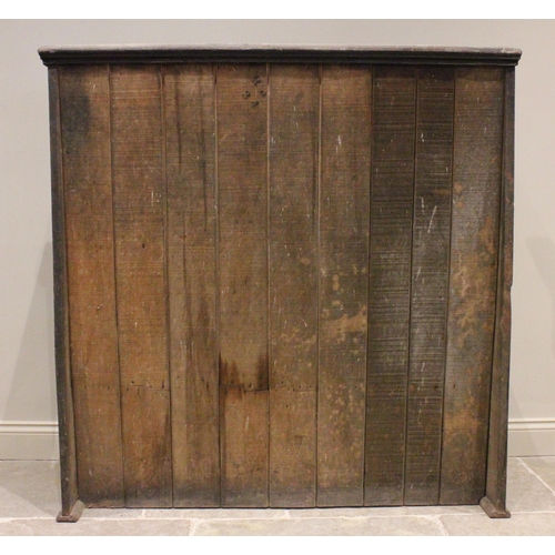 781 - A 19th century scumbled lambing bench/settle, probably pine or elm, the high panelled back extending... 