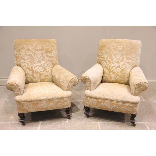 814 - A near pair of Edwardian drawing room chairs, covered in foliate damask fabric, the padded scrolled ... 