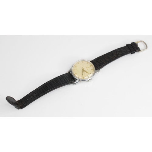 84 - A Gentleman's 1950's Omega automatic wristwatch, the cream circular dial with baton markers, set to ... 