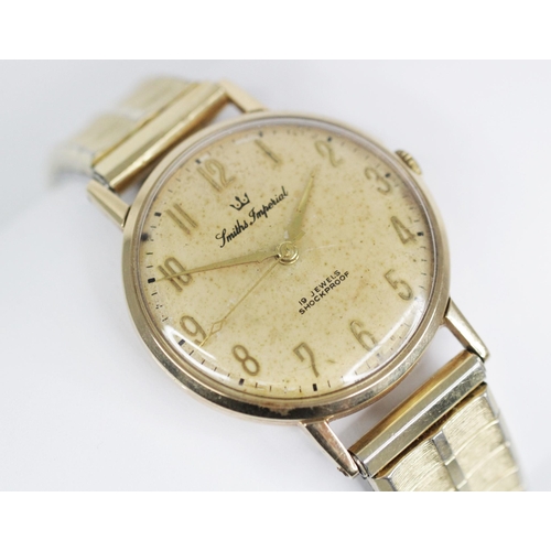 85 - A Gentleman's Smiths Imperial 9ct gold wristwatch, circular dial with gold toned Roman numerals, set... 