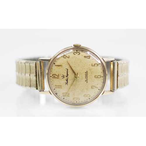 85 - A Gentleman's Smiths Imperial 9ct gold wristwatch, circular dial with gold toned Roman numerals, set... 