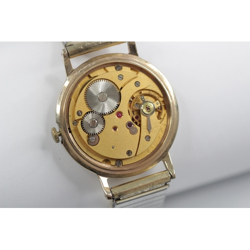 85 - A Gentleman's Smiths Imperial 9ct gold wristwatch, circular dial with gold toned Roman numerals, set... 