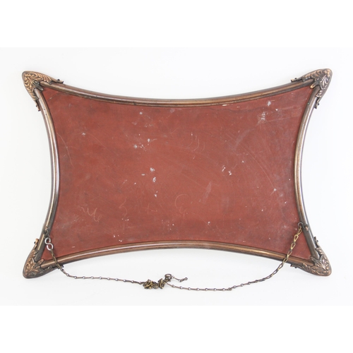 677 - An Art Nouveau style wall mirror, the copper effect shaped tubular frame with with cast acanthus lea... 